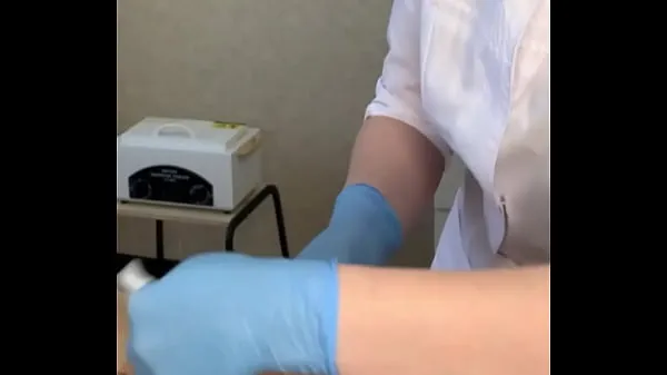 The patient CUM powerfully during the examination procedure in the doctor's hands