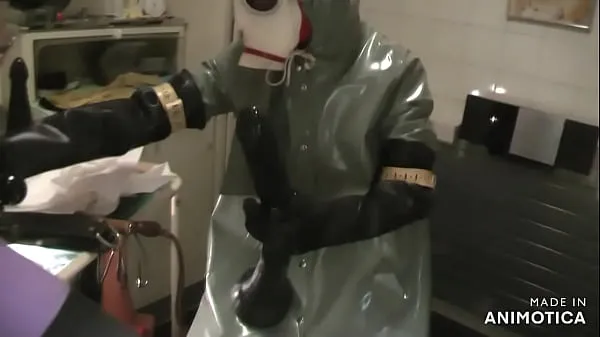 Big Rubbernurse Agnes - Heavy Rubber green clinic gown with hood and white gasmask - deep pegging with two colonoscope-style dildos - final deep analfisting with thick chemical gloves and cum drive Clips